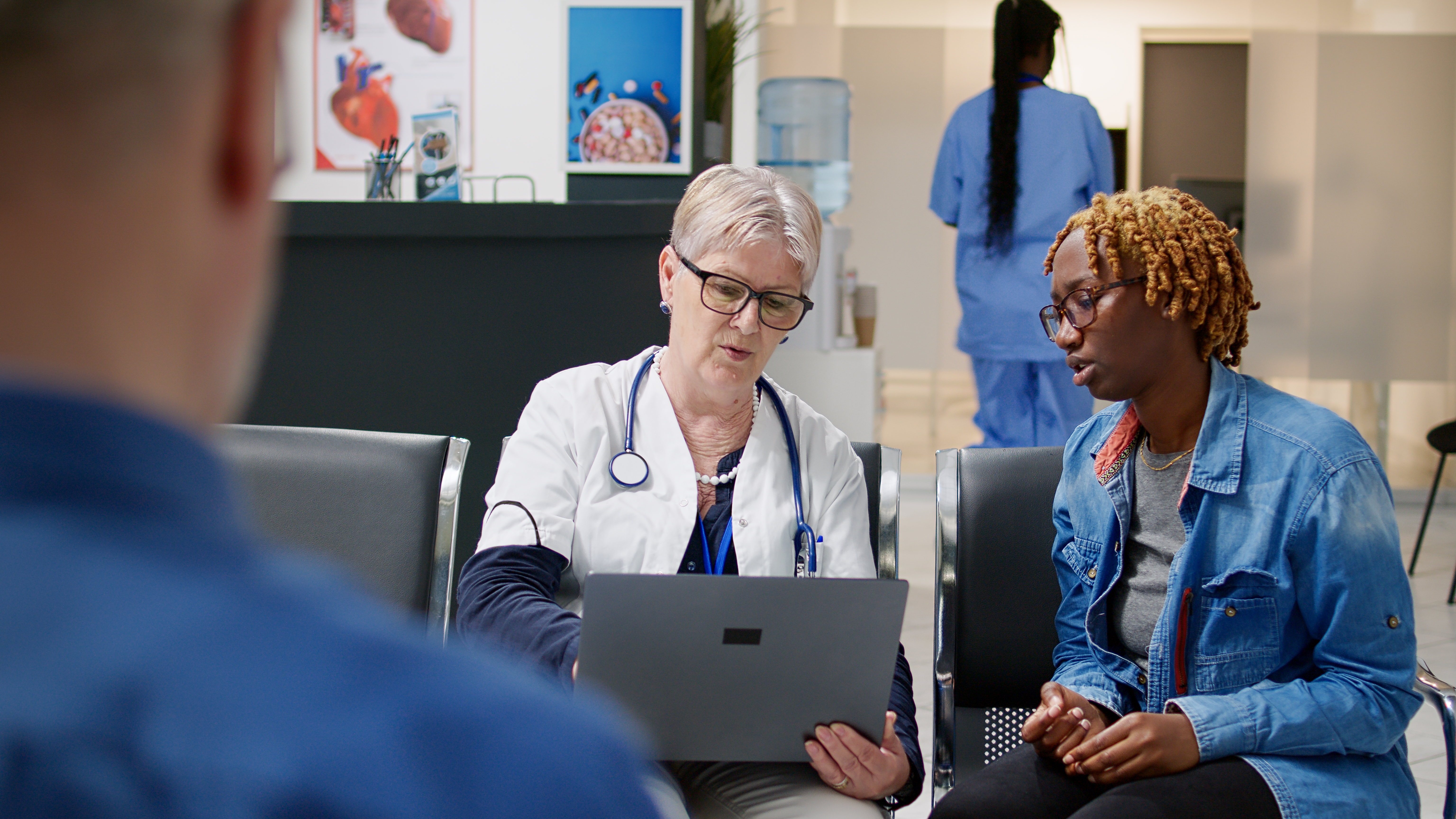 healthcare worker helping patients in a clinic